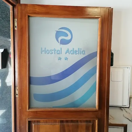 Отель Adelia